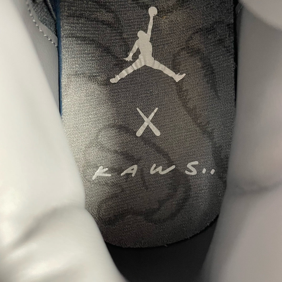 KAWS x Air Jordan 4 "Cool Grey"